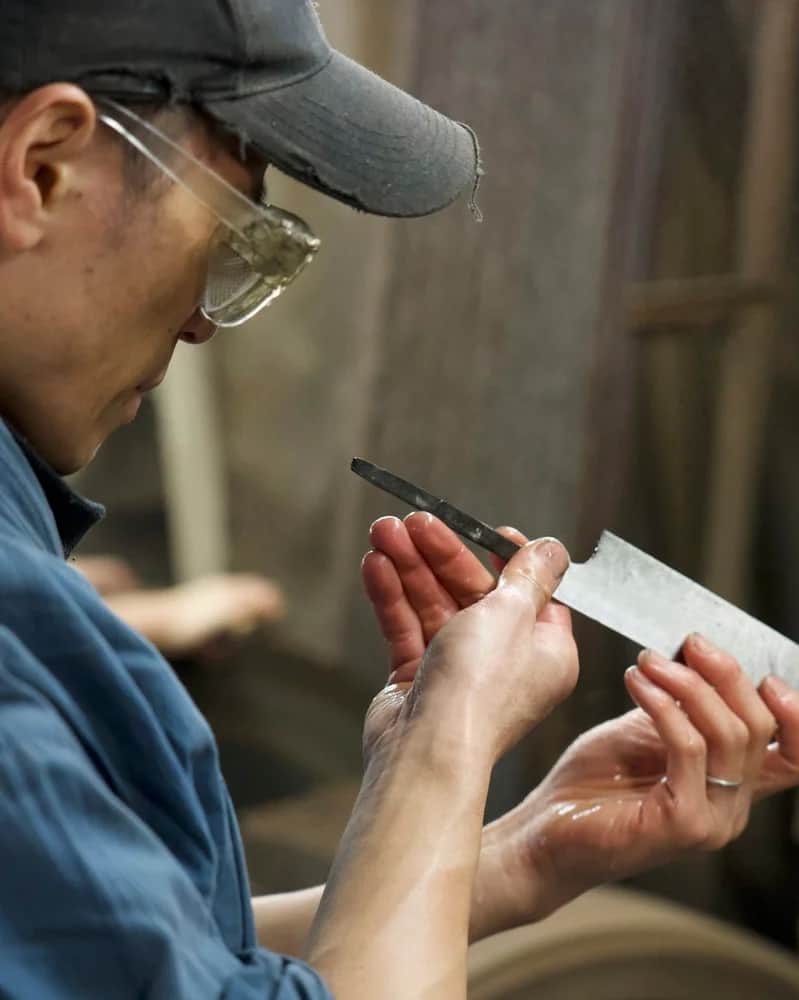 Japanese Master examining quality